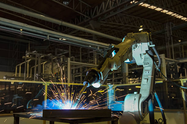 istock robot welding in factory 615638796