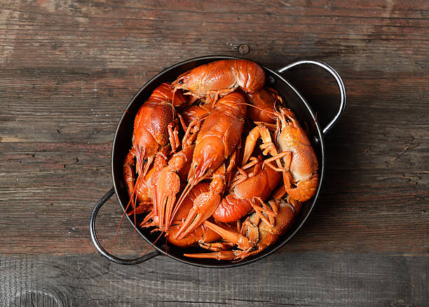 istock boiled crawfish in a plate  on a wooden background 615638942