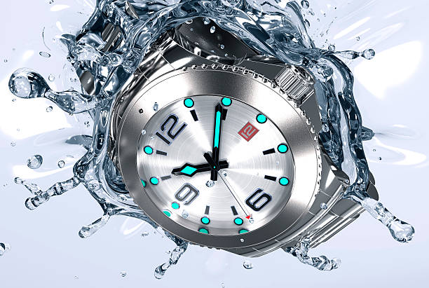 istock beautifull watch falling in water 615639034