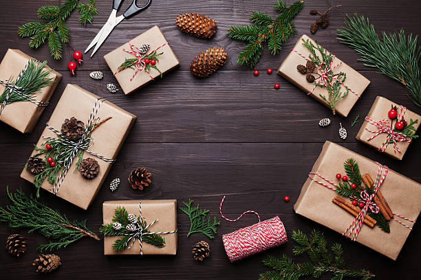 Gift or present box with christmas decoration. Flat lay style.