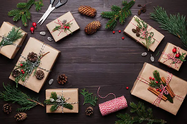 Photo of Gift or present box with christmas decoration. Flat lay style.