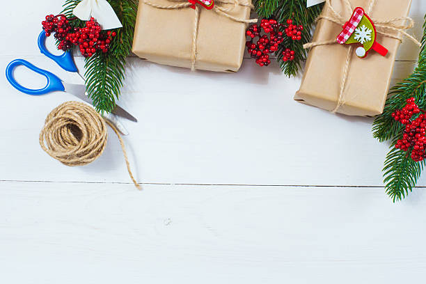 istock Christmas gift and a sprig of pine needles 615640274