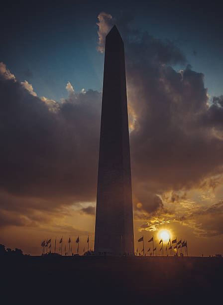istock Washington Monument at sunset sky, DC, USA, vertical image 615704350