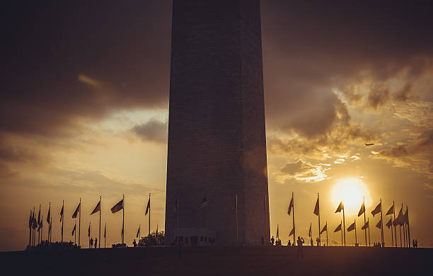 istock Washington Monument at sunset sky,  DC, USA 615704420