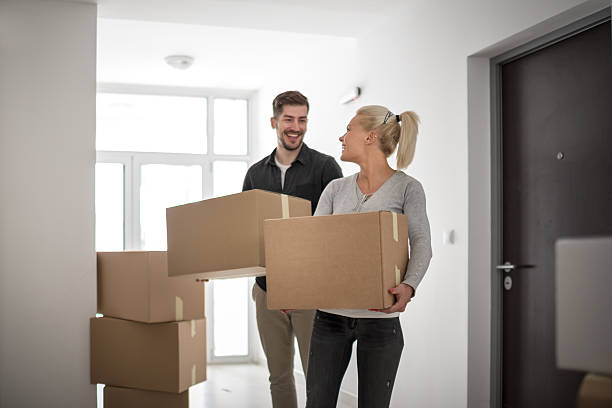 istock Couple moving into new apartment 615706664
