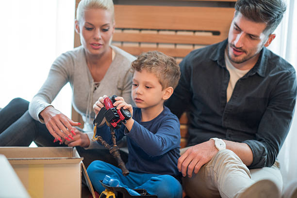 istock Family unpacking the boxes 615706928