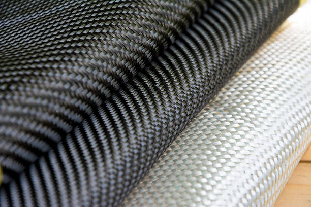 istock Carbon fiber composite material background 615709136