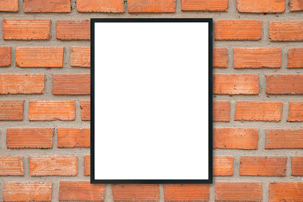 istock Mock up blank poster picture frame on brick wall. 615711394