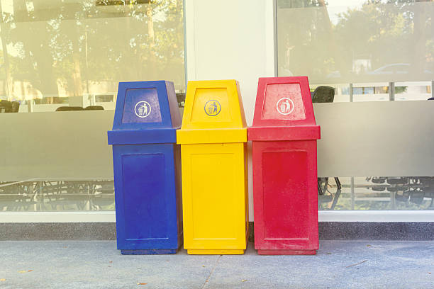 istock Yellow, red and blue recycling bin 615711624
