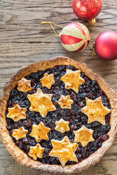istock Mince pie on the wooden background 615712120