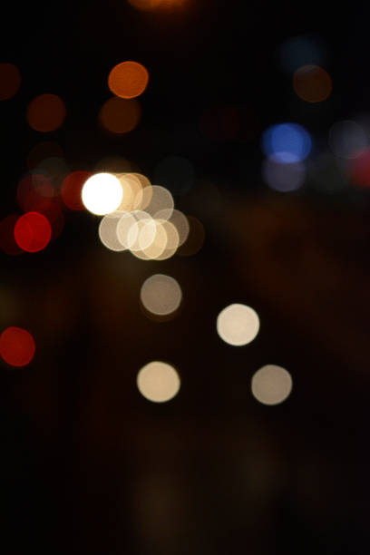 istock Night city street lights bokeh background 615712600