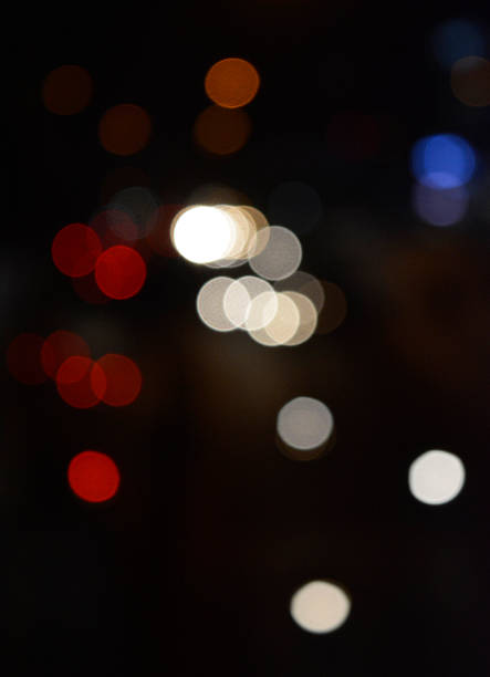 istock Night city street lights bokeh background 615712604