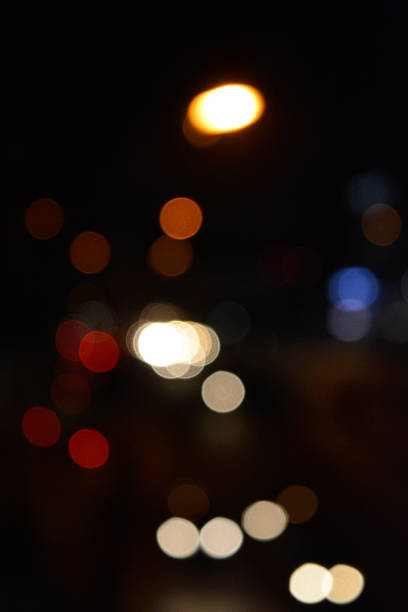 istock Night city street lights bokeh background 615712634
