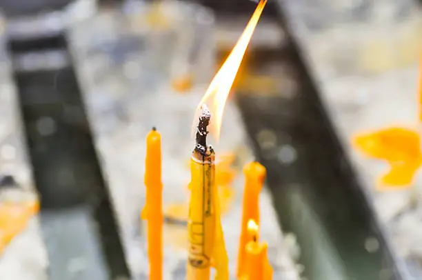 candle,wax or taper in the temple