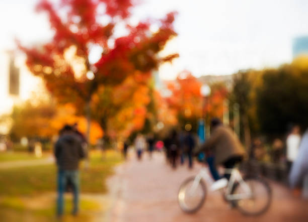 istock blurred background of city life 615714532