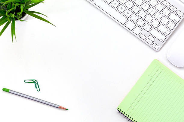 istock Top view of flat Lay office workplace on white Table 615719990
