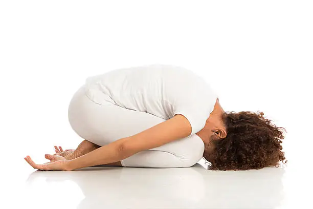 Photo of Beautiful woman doing yoga, isolated on white