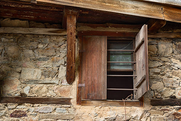 istock Window at one old Bulgarian house in Kovachevitsa village, Bulgaria 615720692