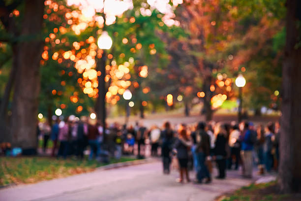 istock blurred background a crowd of people 615720888