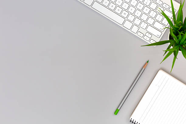 istock Working Place on grey Table with Business and Lifestyle Items 615722948