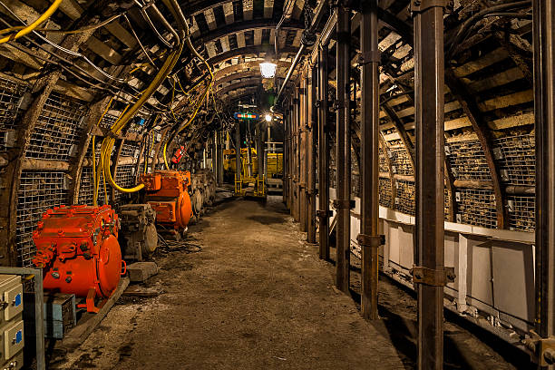 istock Underground corridor with various electrical equipment  in a coal mine 615725694