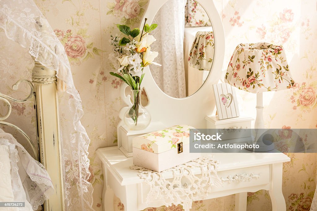 Table with mirror and flowers in provence style Interior photo of table with mirror and flowers in provence style Bedroom Stock Photo