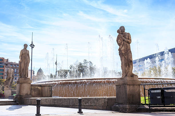 istock Fountain with sculptures on Placa de Catalunya, Barcelona, Spain 615726414