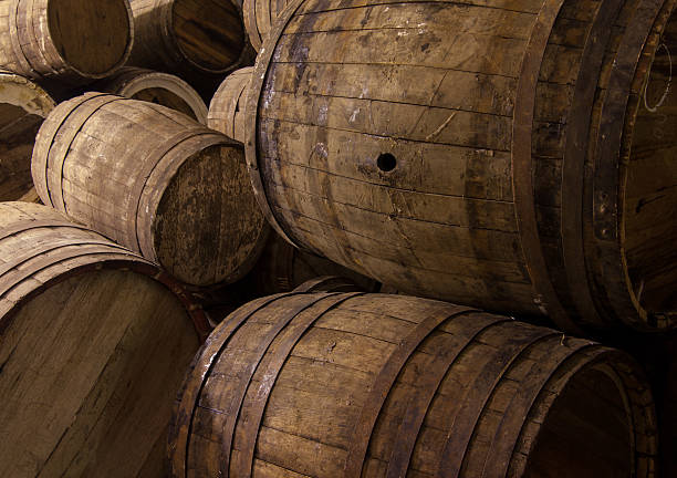 istock wooden wine barrels 615729182