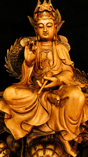 Buddha statue with light dark background . buddha image used as amulets of Buddhism religion.My's amulets .Photo taken on: September 22, 2016