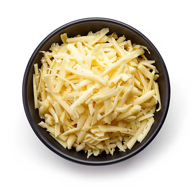 istock Bowl of grated cheese from above 615732418