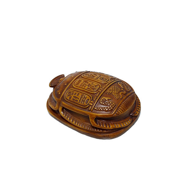 istock Wooden scarab beetle isolated on white 615732648