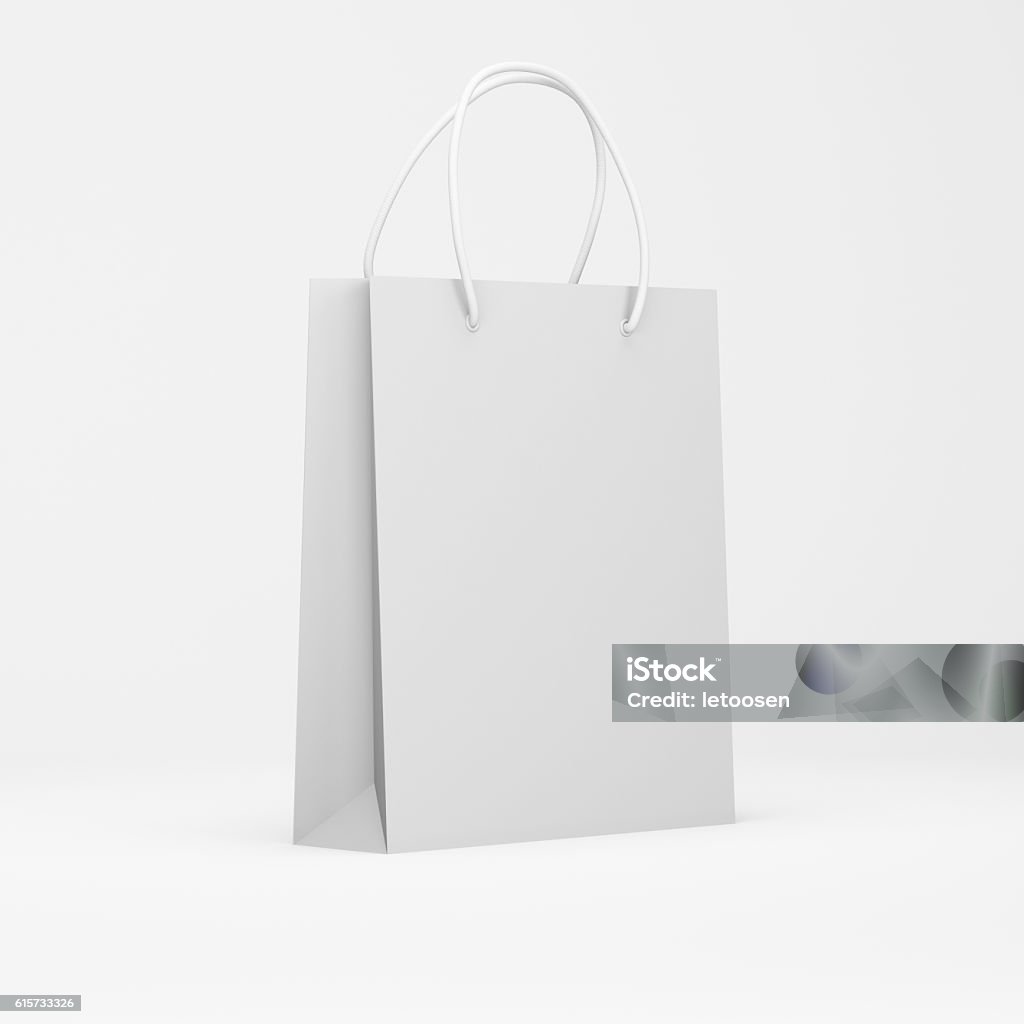 White paper package White paper package isolated on a white background. Blank paper bag . Mock up. 3d render Paper Bag Stock Photo