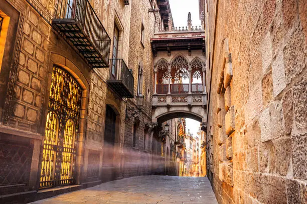 Bridge between buildings in Barri Gotic quarter of Barcelona, Spain