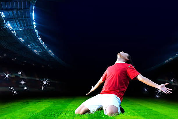 istock Soccer player on field of stadium 615733716