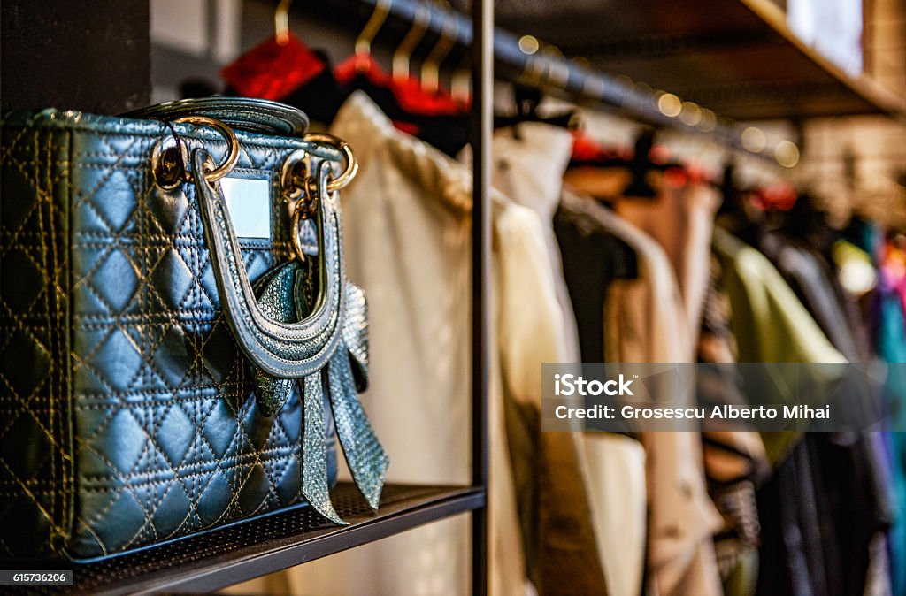 Handbags and clothes in a fashion store Luxury Stock Photo