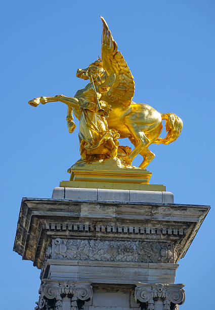 istock The golden statues on Alexandre III bridge in Paris 615736594