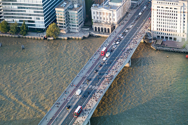 Aerial view of London Bridge, commuters crossing London bridge, London, horizontal orientation, England, UK.