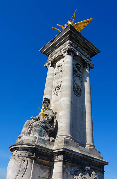 istock Impressive statues on Alexandre III Bridge in Paris 615737098