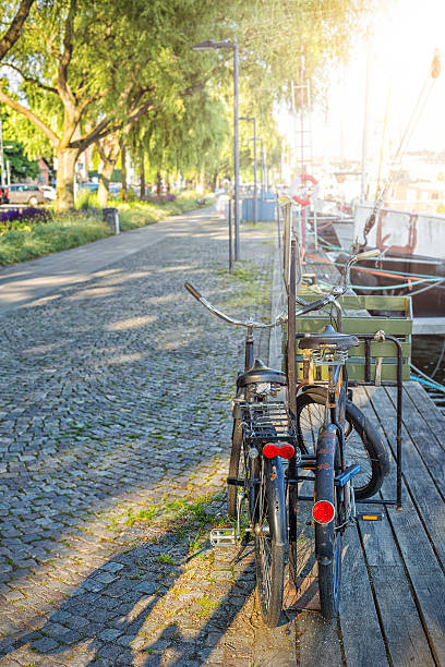 istock Old bicycle in front of a house 615737114
