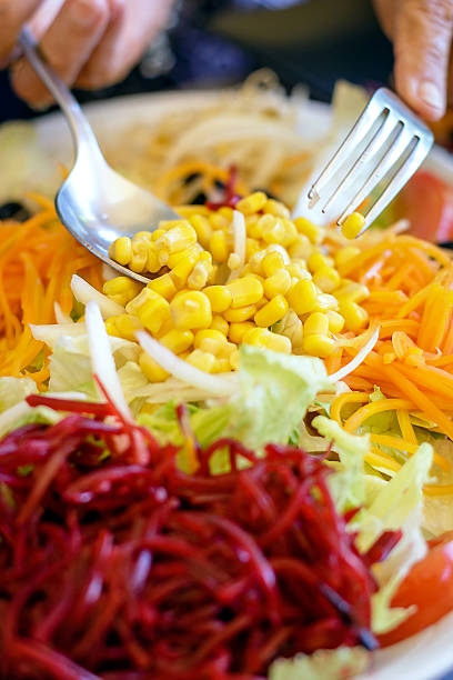 istock Close up of fresh vegetable salad 615740002
