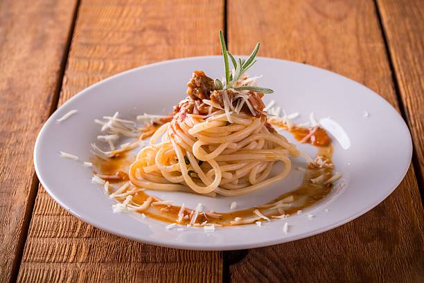 istock Portion of spaghetti with sauce and minced meat 615740280