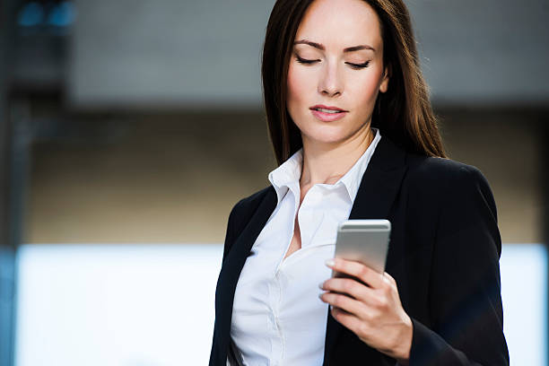 istock Business woman reading a text message 615743800