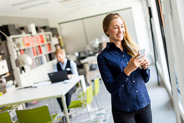 istock Young businesswoman in office 615744574