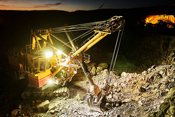 istock Mining construction industry. Excavator digging granite or ore in quarry 615745614