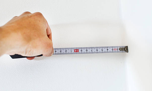 istock The process length measurement using a measuring tape 615748460