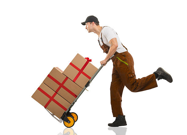 istock Courier runs - the trolley: packages and gifts 615794286