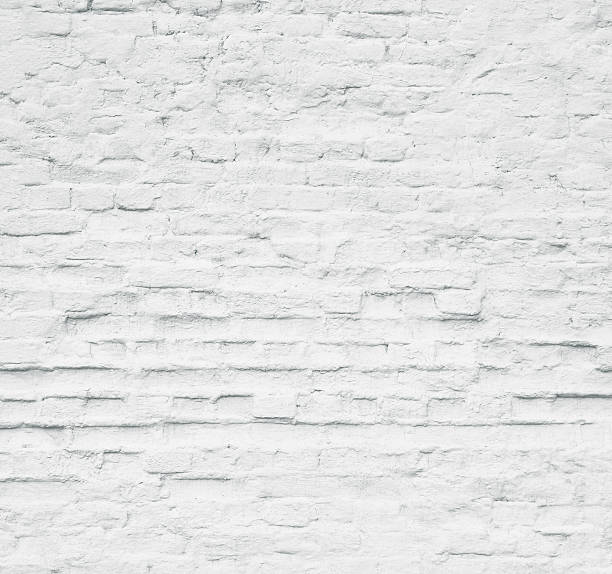 istock Brick grunge white painted crack wall texture background 615797274