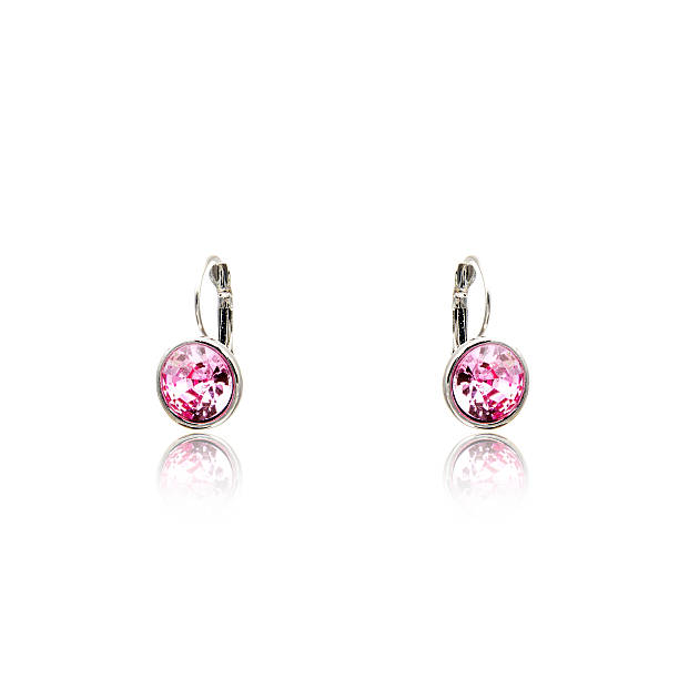 istock Pair of amethyst diamond earrings isolated on white 615797796