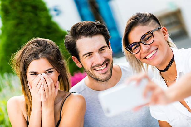 istock Happy friends taking selfie with smartphone 615798000