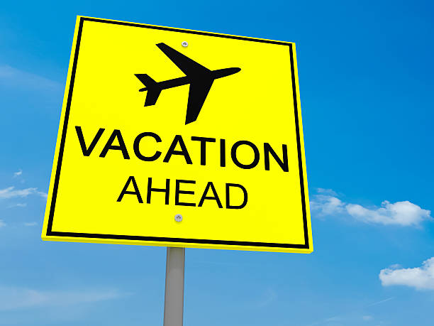 istock Yellow Road Sign Vacation Ahead Against Blue Sky, 3d illustration 615801192